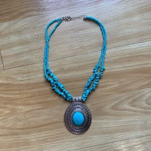 Turquoise and silver costume jewelry.  20 inches.